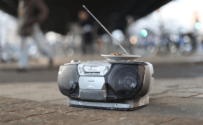 gettoblaster with saucer begging for change