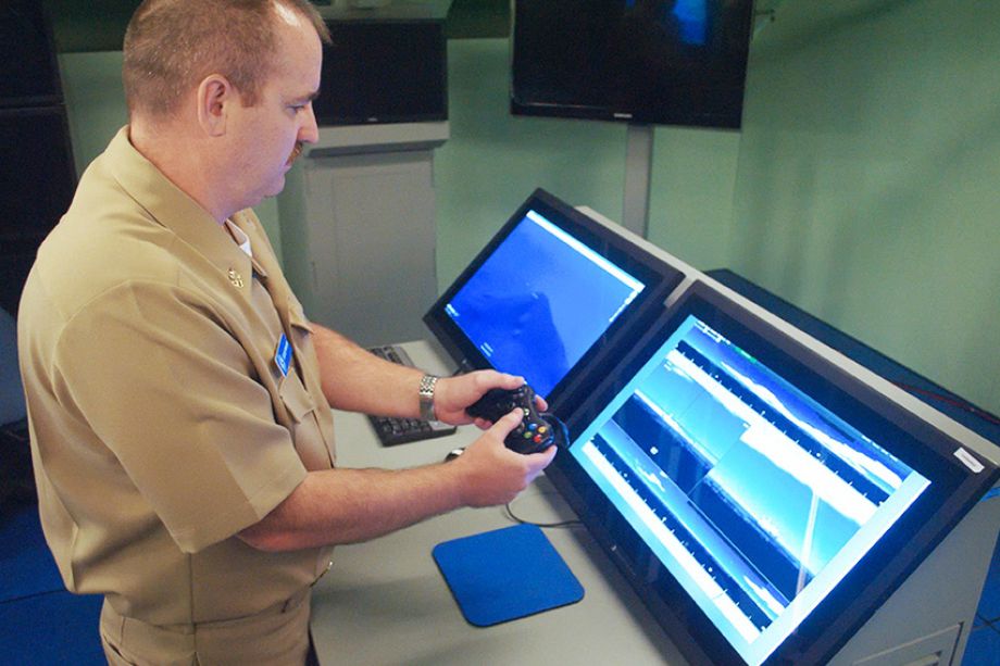 Games become jobs: Looking through the eye of the submarine with an X-Box controller